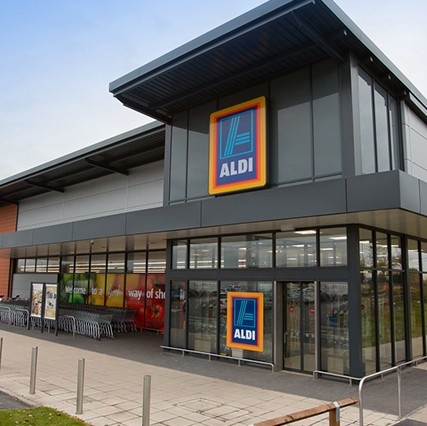 geometric pattern of rectangles in various shades of green and yellow